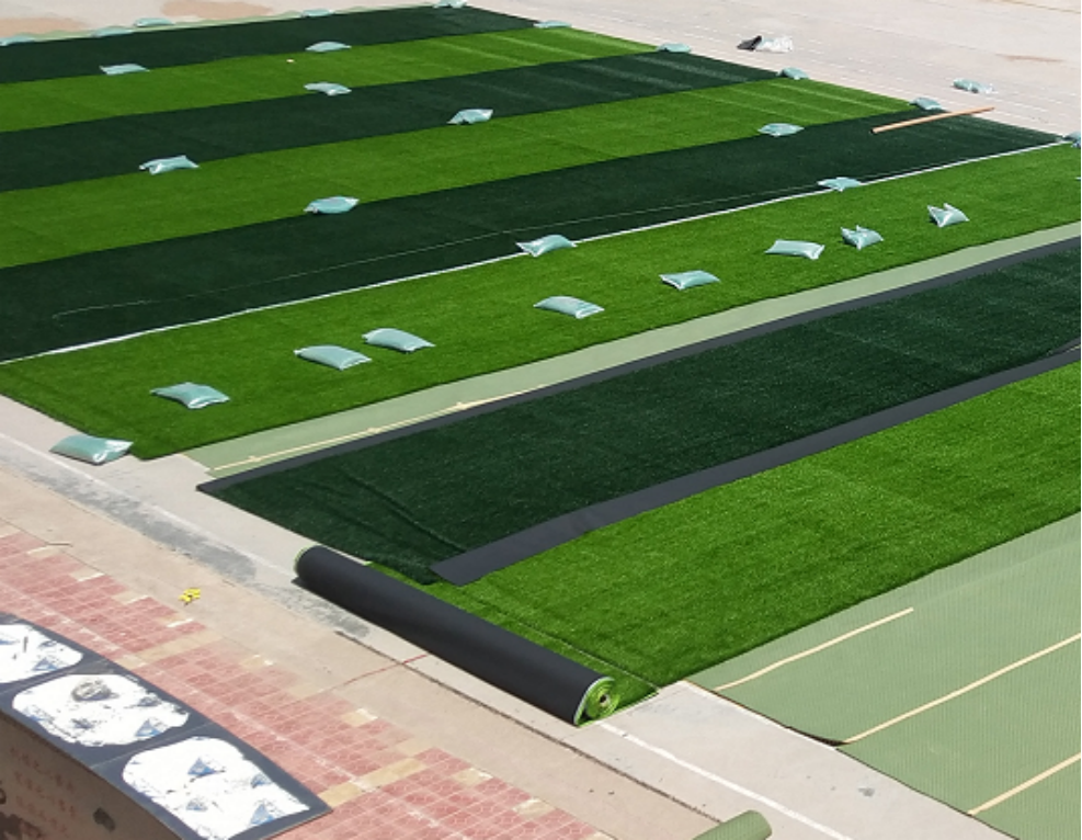 澳门新葡澳京官方网站人造草坪足球场施工步骤图。(图4)